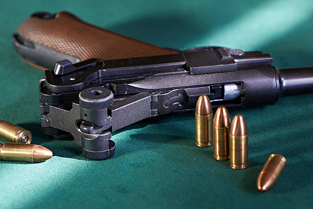 istock German Parabellum pistol with cartridges 504684421