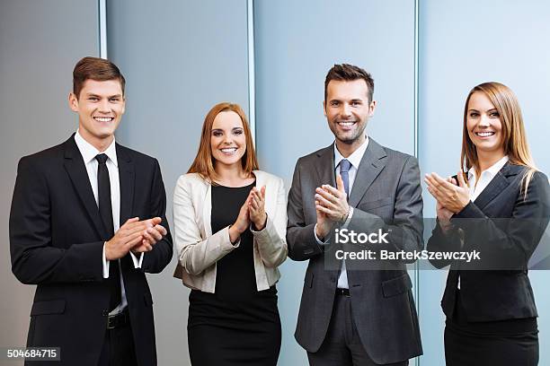 Group Of Happy Business People Clapping Their Hands Stock Photo - Download Image Now