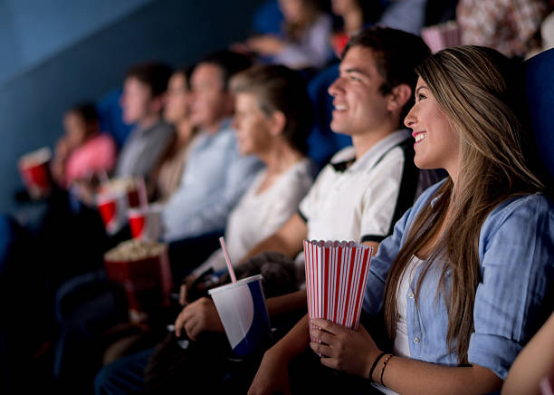 istock People at the cinema 504684837