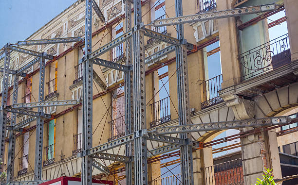 istock facade of old building in remodeling, retaining outside 504685239