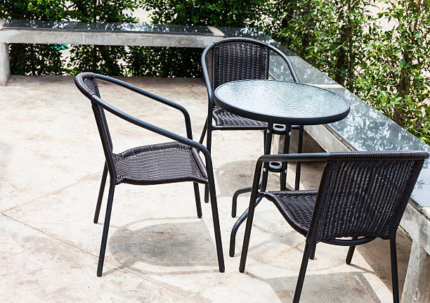 istock Striped table and wicker armchair 504685679