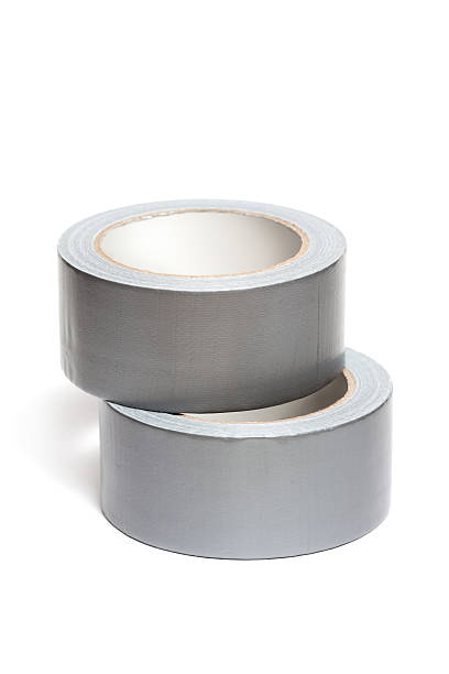 istock Rolls of white adhesive tape 504686381