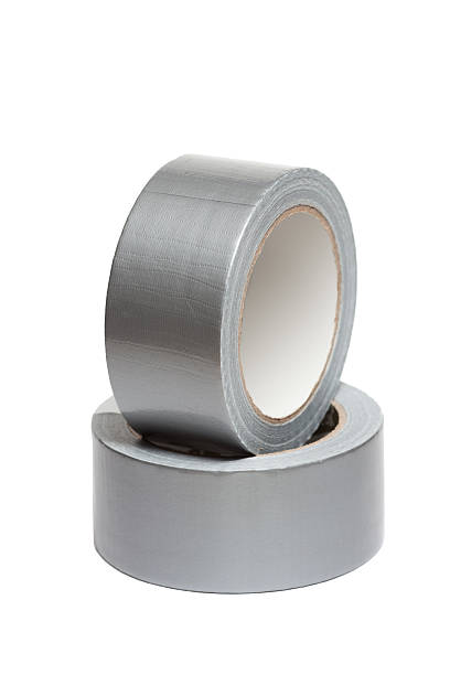 istock Rolls of white adhesive tape 504686389