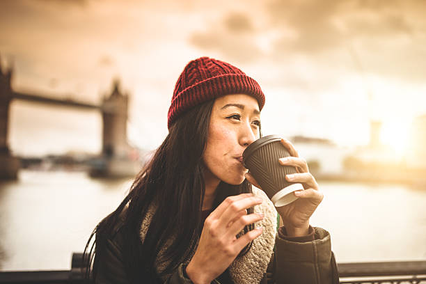istock chinese tourist smiling in London 504686863