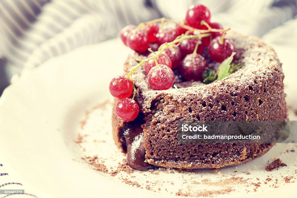 Lava cake in plate Selective focus in the middle of lava cake in plate Berry Fruit Stock Photo