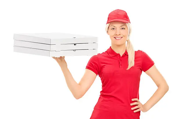 Photo of Pizza delivery girl holding boxes