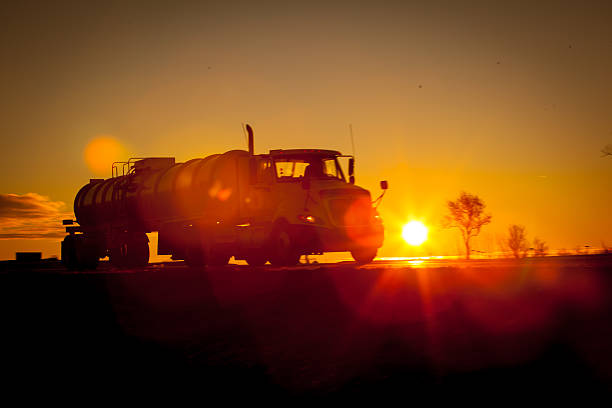 istock Tanker truck at dawn on the highway. 504694024