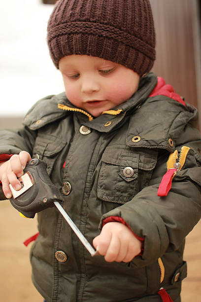 istock the little boy in a jacket 504694338