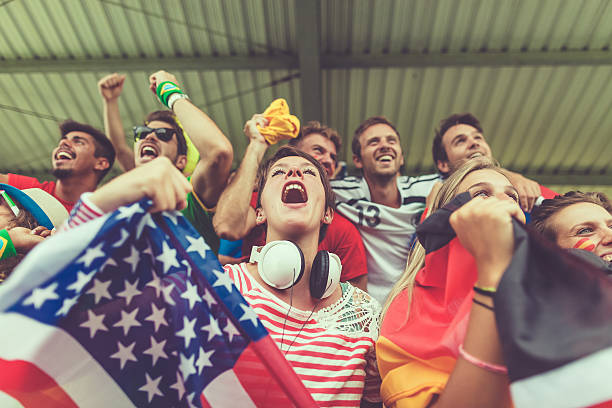 istock Group of multiracial nations supporters together 504695654