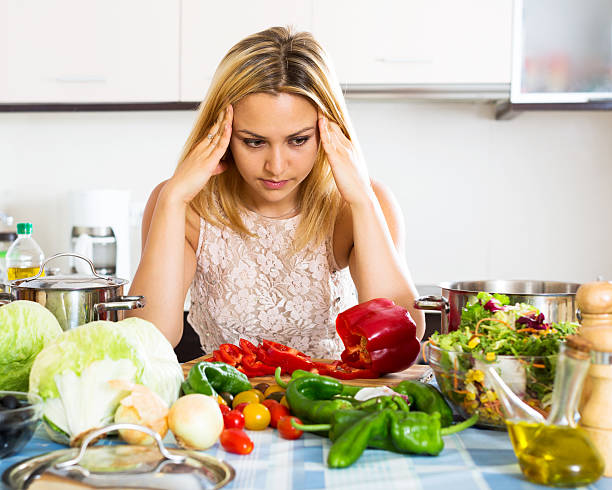 istock Confused housewife in the kitchen 504696250