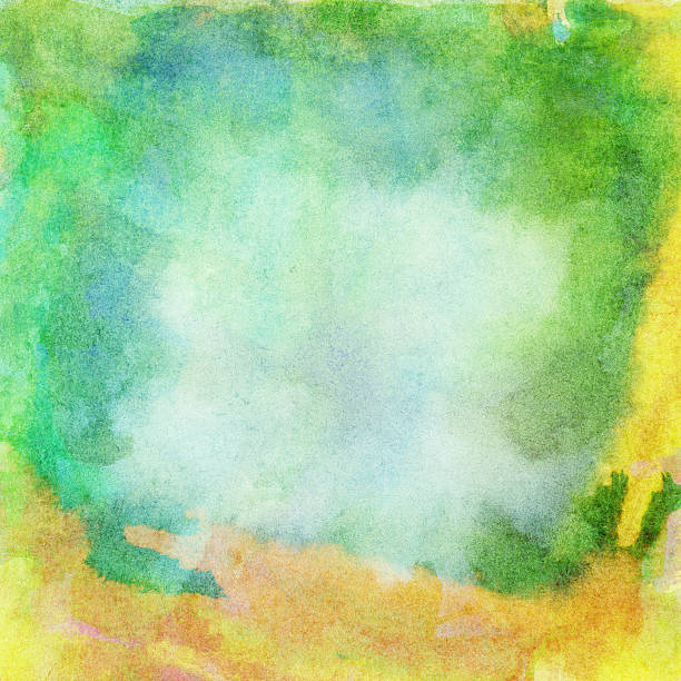 istock Light abstract green, orange painted watercolor splashes background 504697912