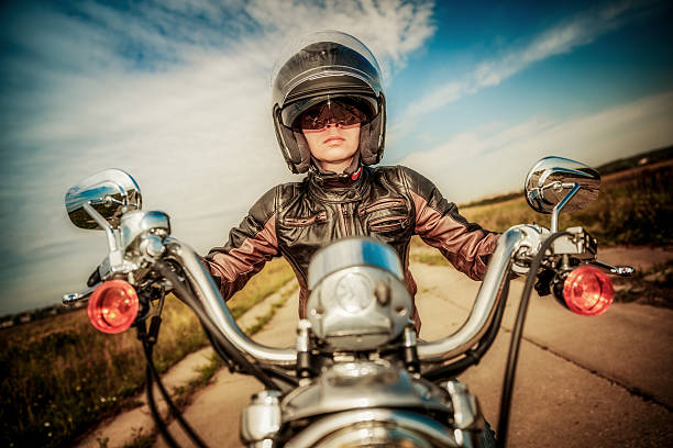 istock Biker girl on a motorcycle 504698348