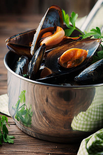 istock Cooked mussels with garlic and parsley 504699234