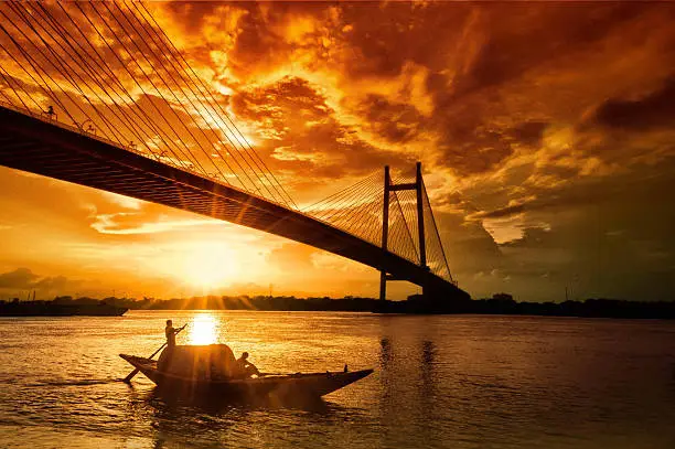 Shot at prinsep ghat near the banks of the Ganges. The bridge is Vidyasagar setu that connects Kolkata and Howrah.