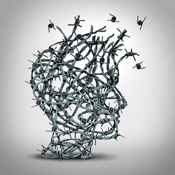 Anxiety Solution Anxiety solution and freedom from fear and escape from tortured thinking and depression concept as a group of tangled barbwire or barbed wire fence shaped as a human head breaking free as a metaphor for psychological or psychiatric icon. prison escape stock pictures, royalty-free photos & images
