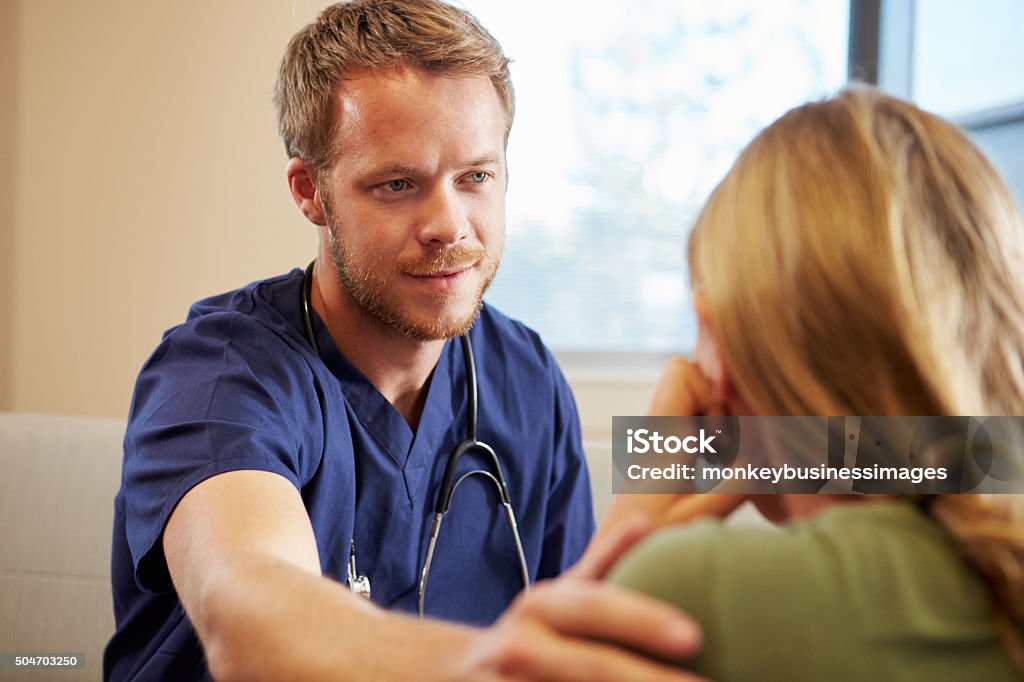 Doctor Treating Teenage Girl Suffering With Depression Nurse Stock Photo Doctor Treating Teenage Girl Suffering With Depression Nurse Stock Photo