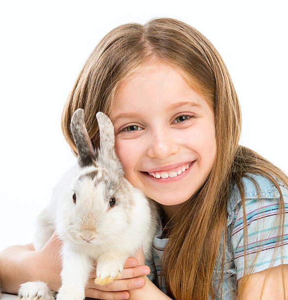 istock little girl with rabbit 504704889