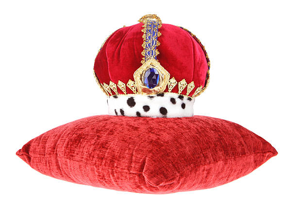istock Crown on Red Velvet Cushion 504706259