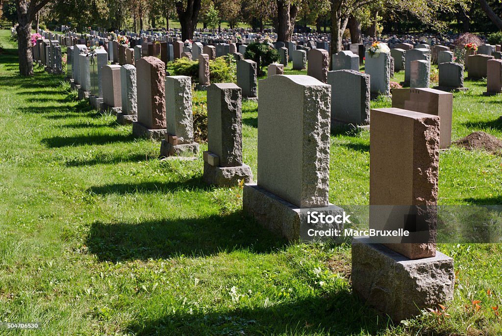 Gravestones in an american Cemetery Gravestones in Montreal Cemetery Cemetery Stock Photo