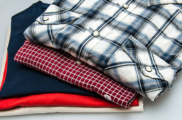 istock Stack of Shirts and T Shirts in different colors 504707429