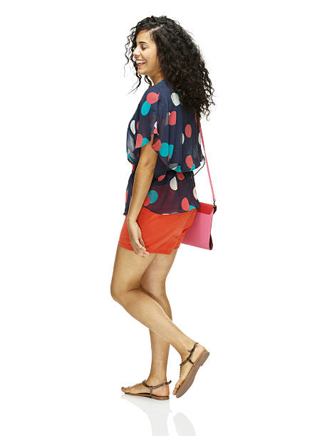 istock Cheerful woman walking 504707905