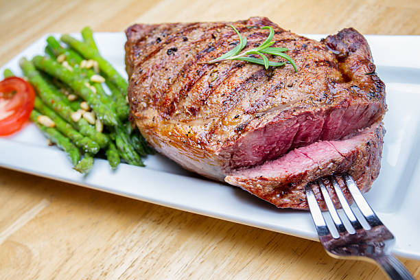 istock Big Rib Eye Beef Steak With Bite Cut Out 504707941