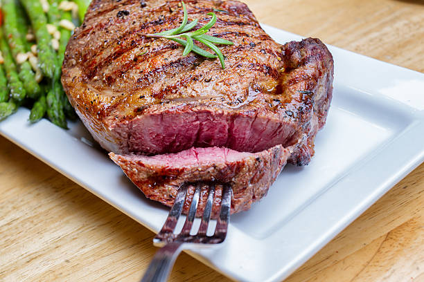 istock Big Rib Eye Beef Steak With Bite Cut Out 504707947
