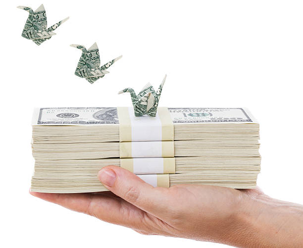 istock Money flying away 504708106