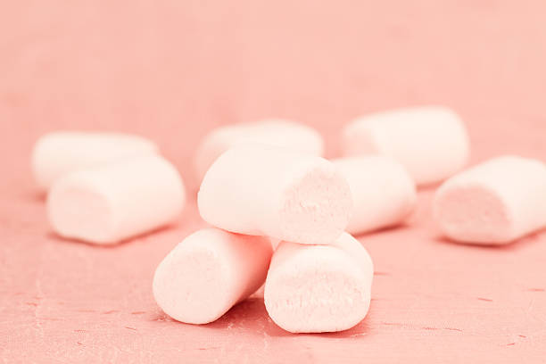 istock sweet marshmallows on a pink background 504708224