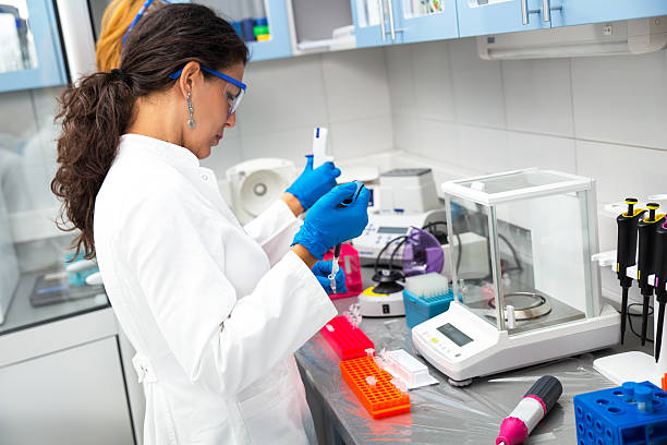 istock Real female scientists researching 504709540