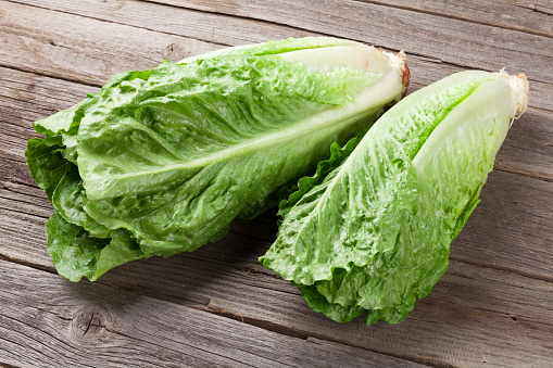 Fresh Romano salad on wooden table