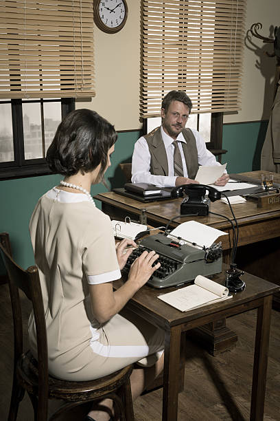 istock Director and secretary working together in the office 504710034