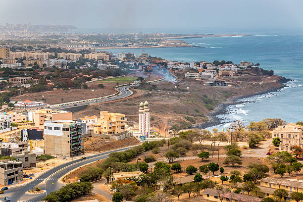 Aerial view of Dakar Aerial view of the city of Dakar, Senegal, showing the densely packed buildings and a highway sénégal stock pictures, royalty-free photos & images
