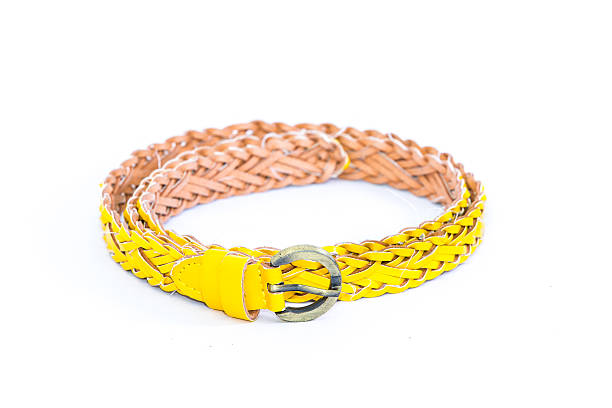 istock yellow woman belt isolated on white background 504711771