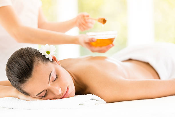 istock Woman having massage with honey 504712271