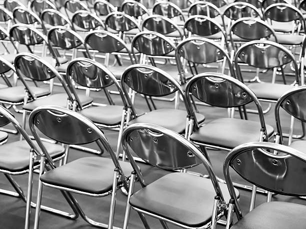 istock Rows of metal chairs 504712509