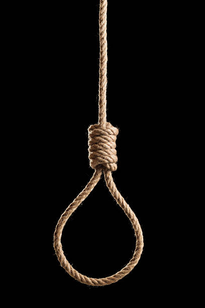 Dark hangmans rope Hangman's rope isolated on black background hangmans noose stock pictures, royalty-free photos & images