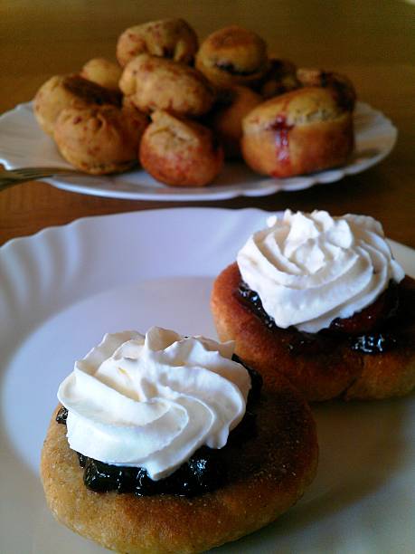 istock Fresh Homemade Doughnuts With Whipped Cream 504740865