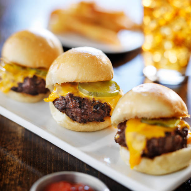 istock burger sliders with melted cheese and pickle 504743023