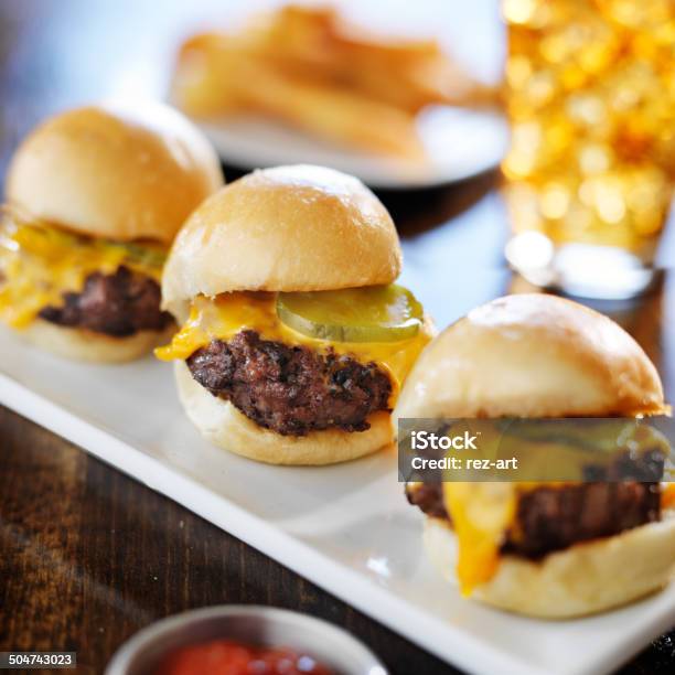 Burger Sliders With Melted Cheese And Pickle Stock Photo - Download Image Now - Slider - Burger, Beef, Burger