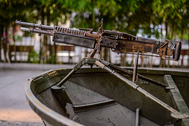 Military boat with gun stock photo