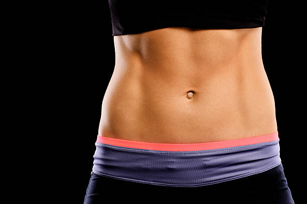 istock Muscular female abdomen 504744676