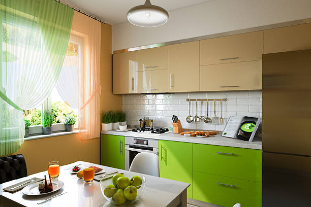 3D illustration of kitchen with beige and green facades stock photo