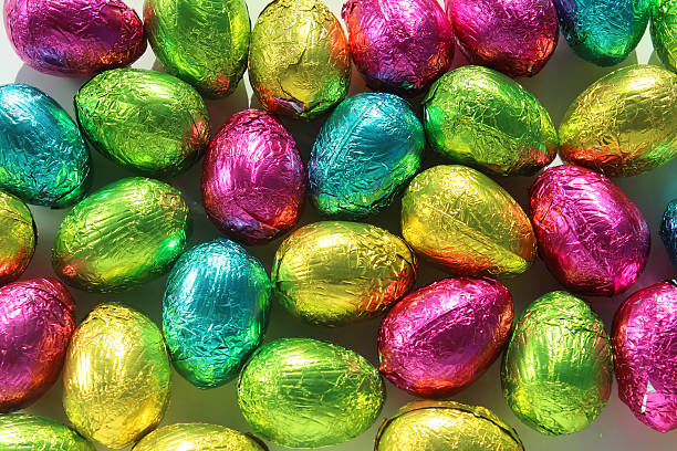 istock Image of yellow, blue, pink, green chocolate foil-wrapped Easter eggs 504746248