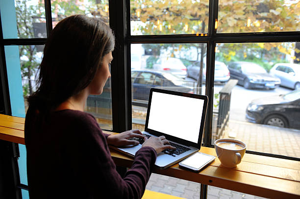 istock Young woman working in a coffee shop 504746578