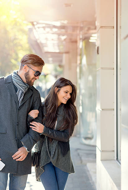 istock Young affluent couple enjoying a shopping trip 504747254