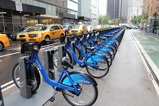 New York, USA - June 10, 2013: Citibike bicycle sharing station in New York. With 330 stations and 6,000 bicycles it is one of top 10 bike sharing systems in the world.