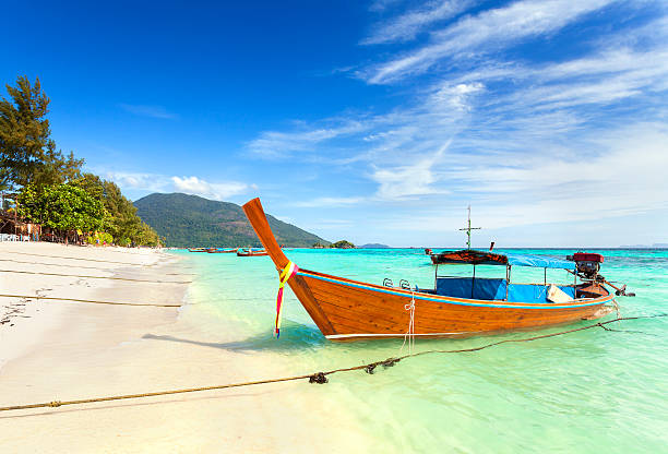 istock Long tail boat at a beautiful beach, Thailand. 504749044