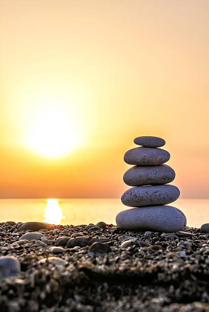istock Stack of stones against golden sunset 504749762
