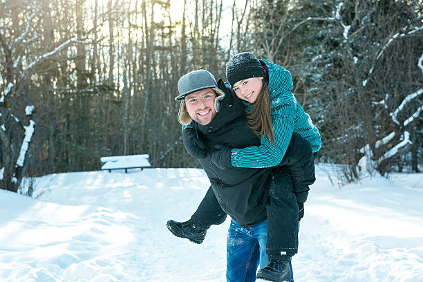 istock Young daughter father winter 504749886
